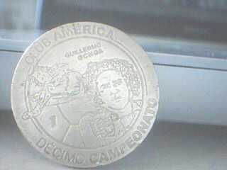 Фотоий: надувательство монетки MONEDA AMERICA