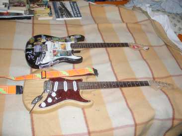 Фотоий: надувательство гитары и другие аппаратуры шнура FENDER - TRIBUTE LEGACY