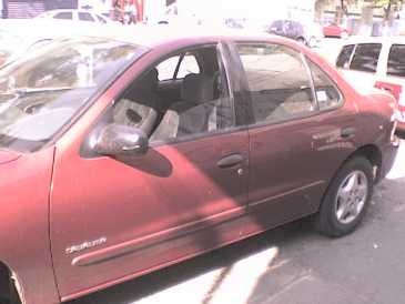 Фотоий: надувательство автомобили CHEVROLET - CAVALIER
