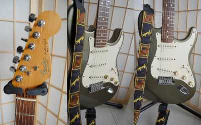 Фотоий: надувательство гитары и другие аппаратуры шнура FENDER - STRATOCASTER