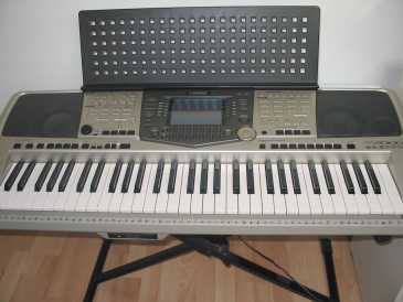 Фотоий: надувательство рояли и synthetizers YAMAHA - YAMAHA PSR 2000