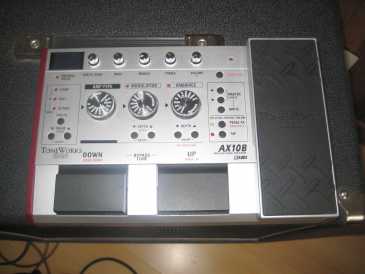 Фотоий: надувательство вспомогательное оборудование и влияния KORG - AX10 B