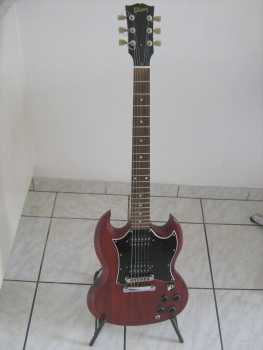Фотоий: надувательство гитары и другие аппаратуры шнура GIBSON - GIBSON SG CHERRY