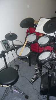 Фотоий: надувательство выстукивания ROLAND - ROLAND TD9 KX