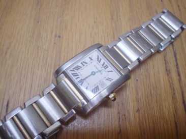 Фотоий: надувательство вахты женщины - CARTIER - TANK FRANCAISE