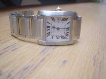 Фотоий: надувательство вахты женщины - CARTIER - TANK FRANCAISE