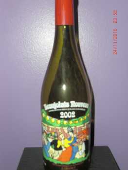 Фотоий: надувательство другие предметы BOUTEILLE DE COLLECTION BEAUJOLAIS NOUVEAU 2002 - BEAUJOLAIS NOUVEAU