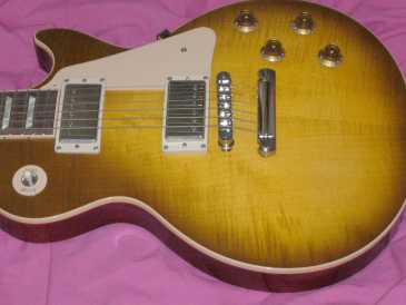 Фотоий: надувательство гитары и другие аппаратуры шнура GIBSON - LES PAUL STANDARD HONEY BURST DE 2005