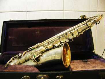 Фотоий: надувательство латунь, woodwind и другие аппаратуры ветра BUESCHER - BUESCHER C MELODY