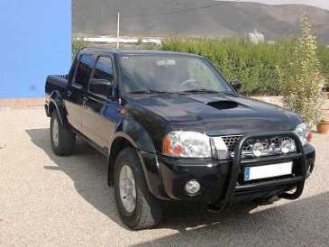 Фотоий: надувательство автомобили NISSAN - Pick-up