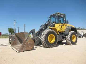 Фотоий: надувательство автомобили KOMATSU WA250PT-5L