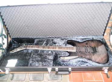 Фотоий: надувательство гитары и другие аппаратуры шнура ESP LTD DELUXE M-1000 - ESP LTD DELUXE M-1000