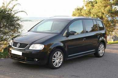 Фотоий: надувательство автомобили VOLKSWAGEN - Touran