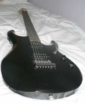 Фотоий: надувательство гитары и другие аппаратуры шнура MUSIC MAN - JOHN PETRUCCI 6 CORDES
