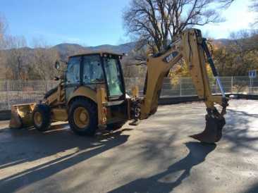 Фотоий: надувательство машины CATERPILLAR - TRACTOPELLE CATERPILLAR 432 E