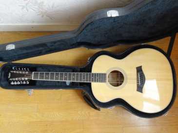 Фотоий: надувательство гитары и другие аппаратуры шнура GUITARE TAYLOR 12 CORDES (USA),OCCASION - GUITARE TAYLOR