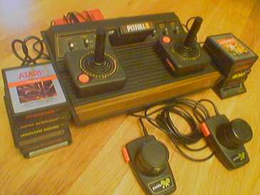Фотоий: надувательство видео- игры ATARI - ATARI CX-2600-P - ATARI CX-2600-P  (IMPECABLE)