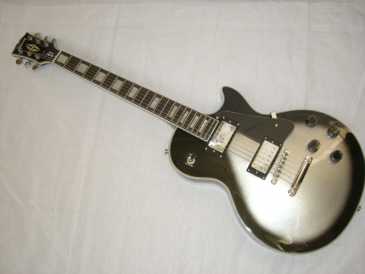 Фотоий: надувательство гитары и другие аппаратуры шнура GIBSON - LES PAUL CUSTOM