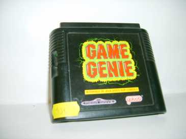 Фотоий: надувательство видео- игры GALOOB - GAME GENIE MEGA DRIVE
