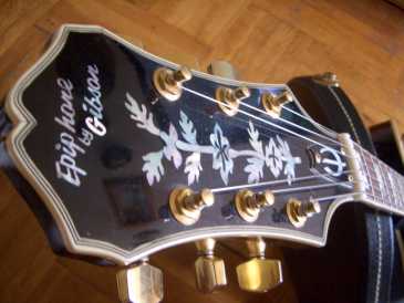 Фотоий: надувательство гитары и другие аппаратуры шнура EPIPHONE BY GIBSON - SHERATON