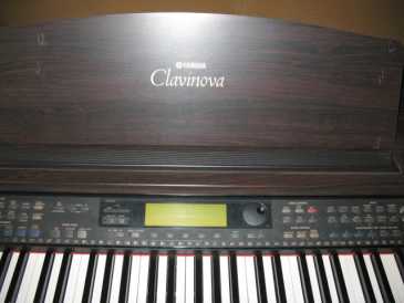 Фотоий: надувательство гитары и другие аппаратуры шнура YAMAHA - CVP103
