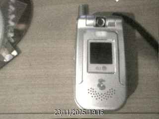 Фотоий: надувательство телефоны клетки LG - U8360
