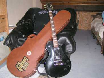 Фотоий: надувательство гитары и другие аппаратуры шнура GIBSON - LESPAUL STUDIO