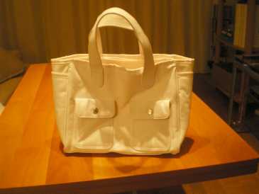 Фотоий: надувательство вспомогательное оборудование женщины - GUERLAIN - SAC FEMME GUERLAIN BLANC NEUF