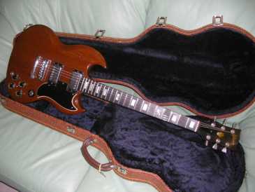 Фотоий: надувательство гитары и другие аппаратуры шнура GIBSON - SG STANDARD 1973