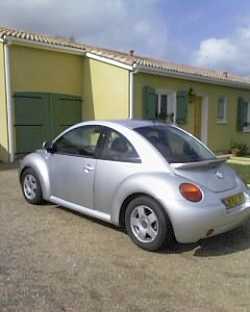 Фотоий: надувательство автомобили VOLKSWAGEN - New Beetle