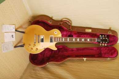 Фотоий: надувательство гитары и другие аппаратуры шнура GIBSON - LES PAUL