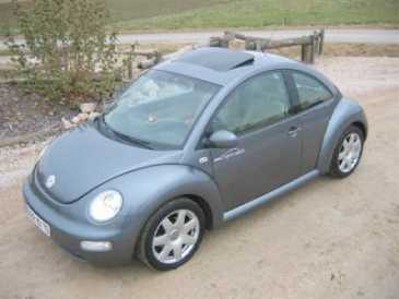 Фотоий: надувательство автомобили VOLKSWAGEN - New Beetle