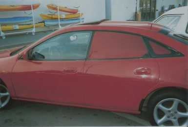 Фотоий: надувательство автомобили MAZDA - 323F