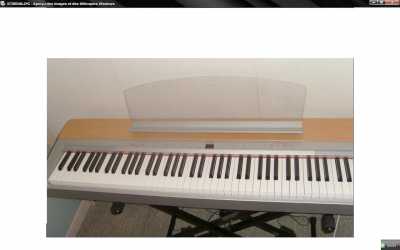 Фотоий: надувательство рояли и synthetizers YAMAHA - P140
