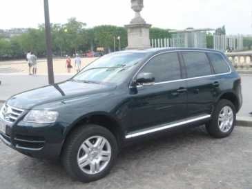 Фотоий: надувательство автомобили VOLKSWAGEN - TOUAREG