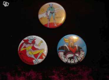 Фотоий: надувательство обширные фасоли, kinders, сосенки и держатели клю&# BADGES GOLDORAK