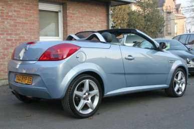 Фотоий: надувательство автомобили OPEL - Tigra