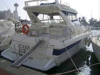 Фотоий: надувательство шлюпки BAYLINER - AVANTI 42 SUN BRIDGE