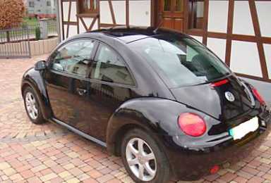 Фотоий: надувательство автомобили VOLKSWAGEN - New Beetle