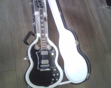 Фотоий: надувательство гитары и другие аппаратуры шнура GIBSON SG STANDARD - SG STANDARD