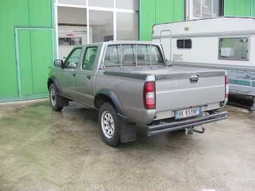 Фотоий: надувательство автомобили NISSAN - Pick-up